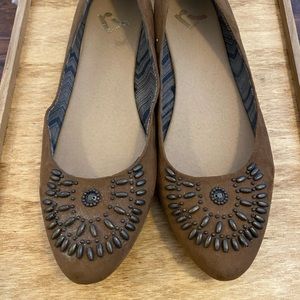 Brown suede flats